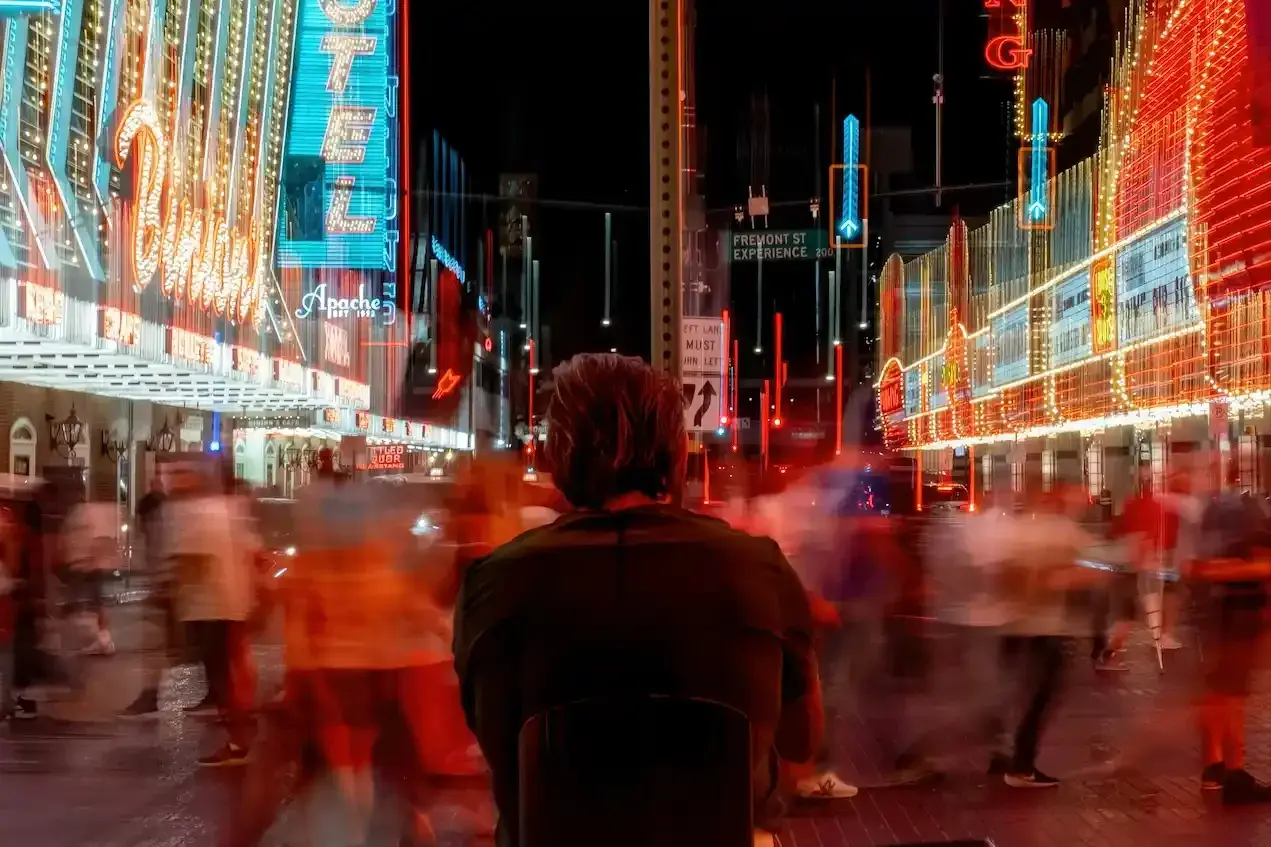 Fremont Street in Las Vegas crowded with pedestrians at night — pedestrian accident risk areas