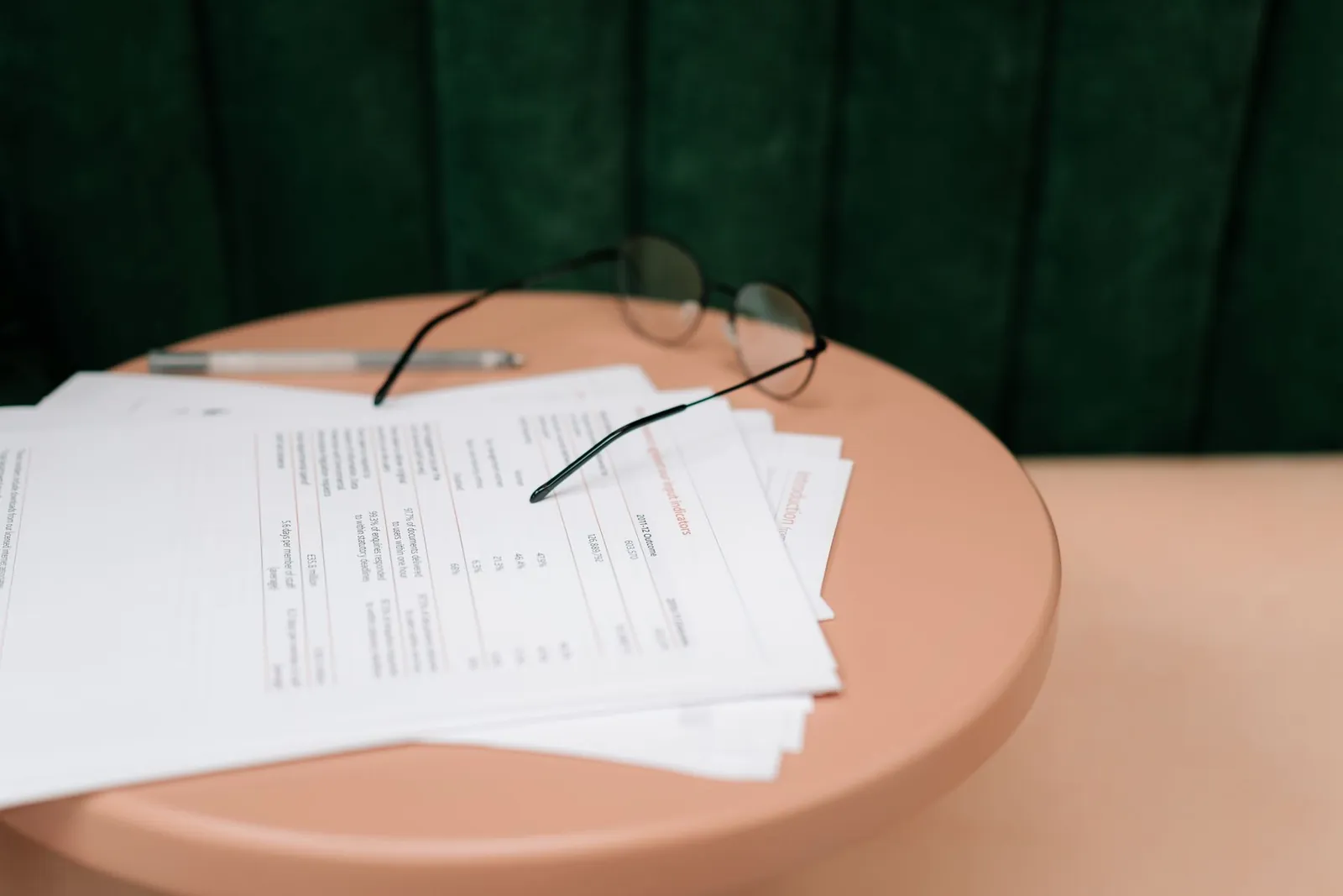 Insurance policy papers and a pen on a table
