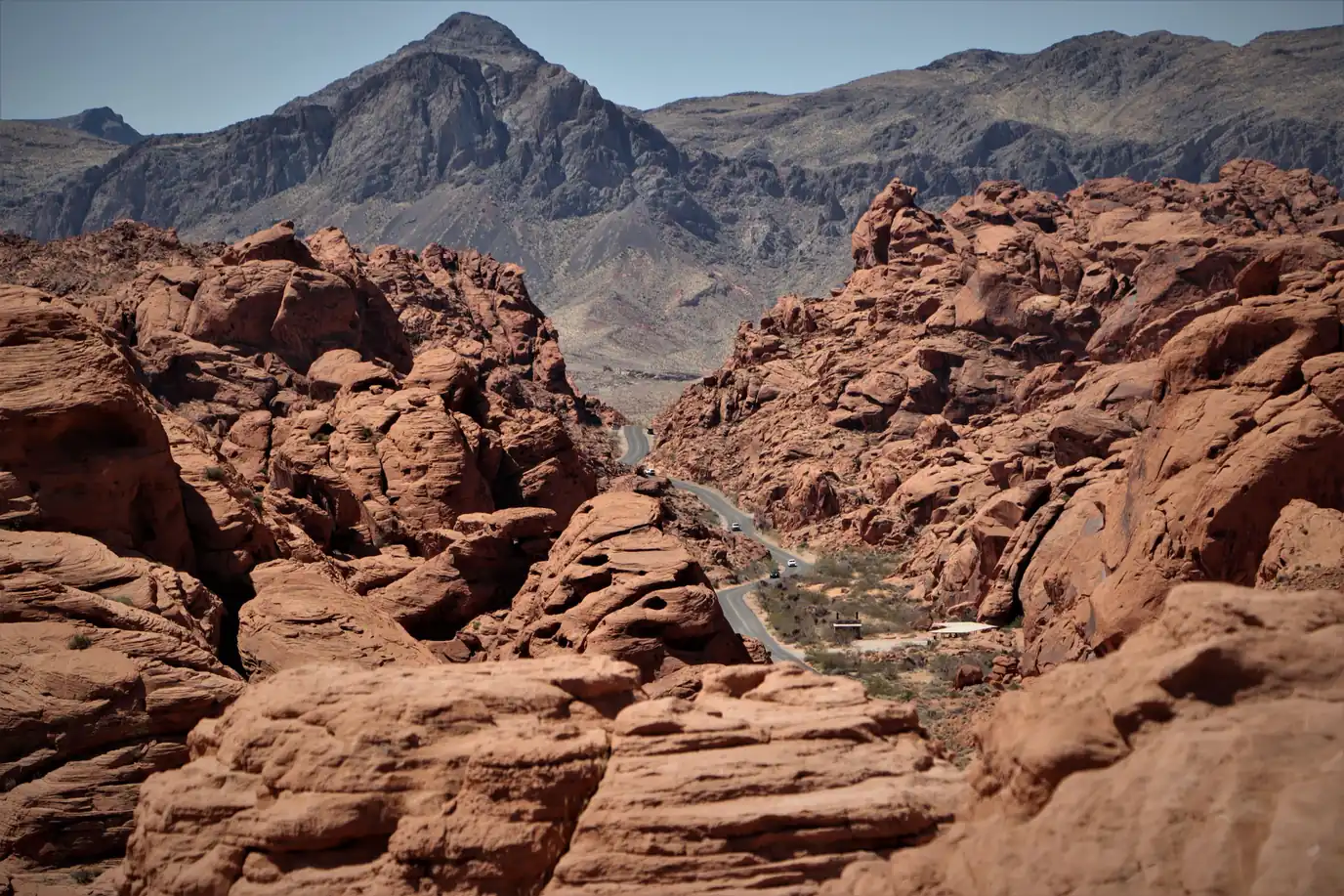 A road through red rock desert mountains west of Las Vegas